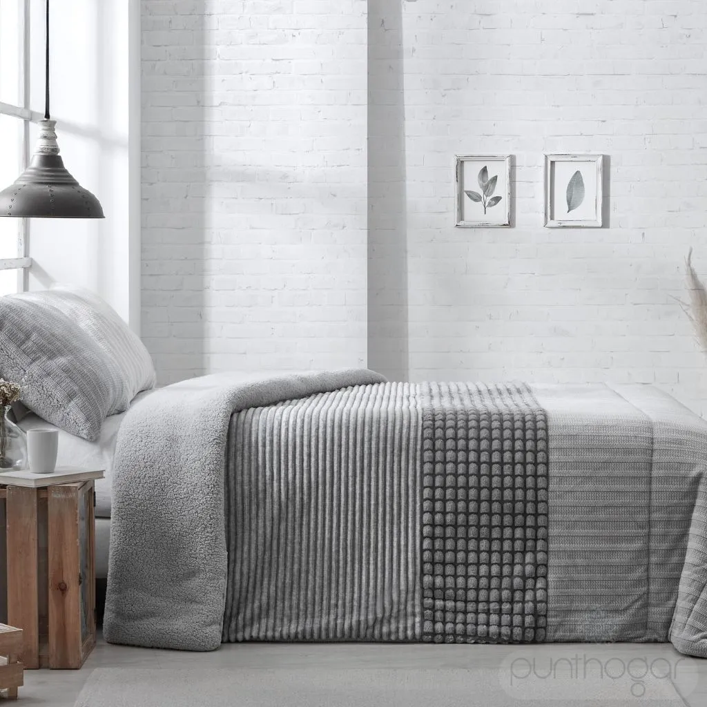 Edredón sherpa borreguito Manterol Doko 070 gris con terciopelo en relieve en dormitorio moderno